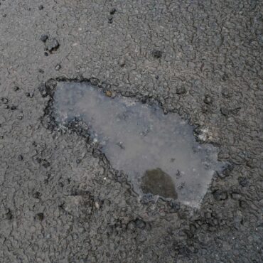 Commons committee chairman says local roads are riddled with potholes