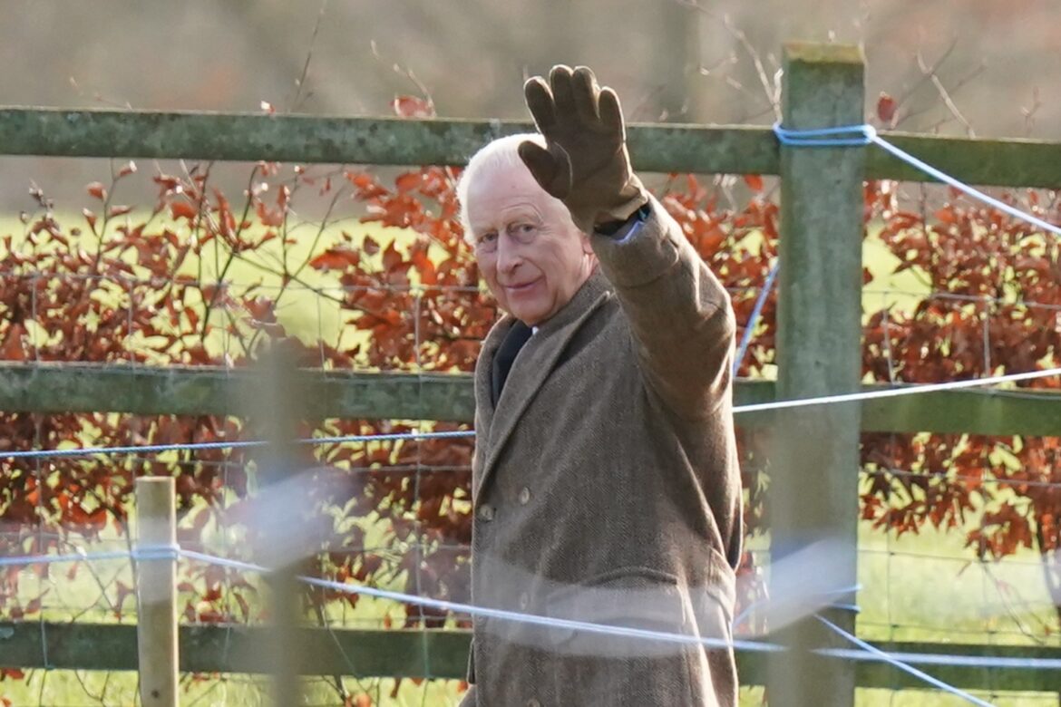 King waves as he leaves Sandringham church service