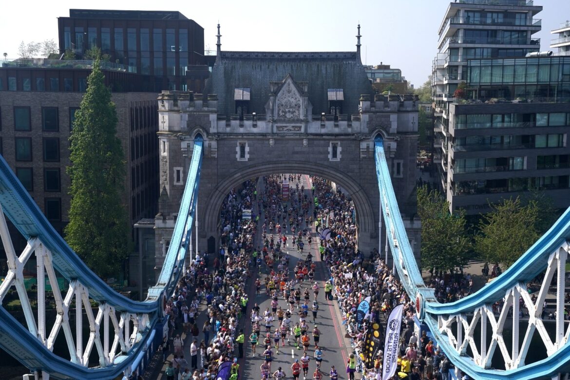 Thousands cross finish line of London Marathon as temperatures hit 222C